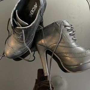 Black boot looking wedges.